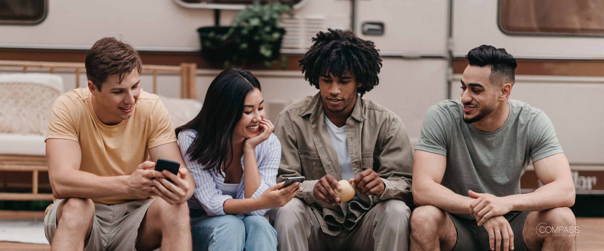 Group of friends looking up articles on there phones for support