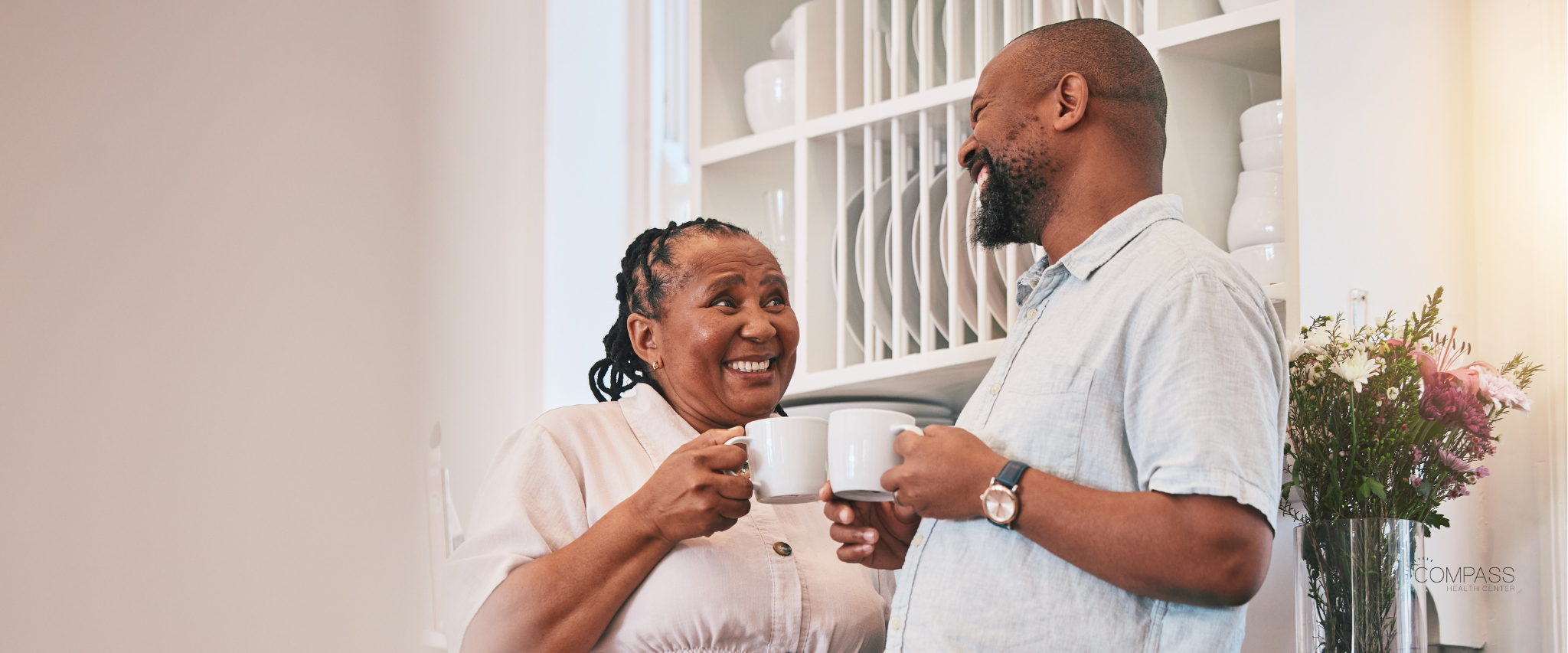 Prioritizing self-care: Two people talking, drinking coffee